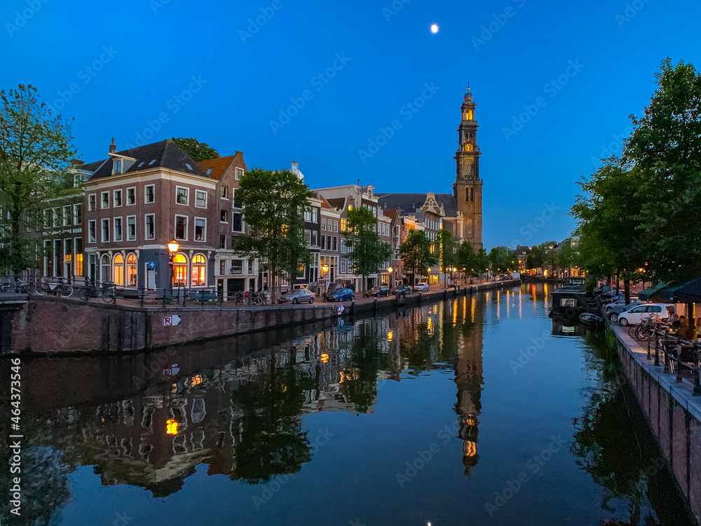 Buildings Reflecting on Canal in Amsterdam