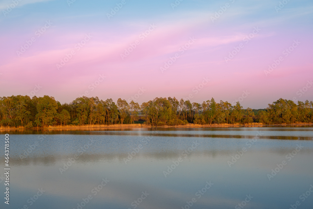 Lake. Sunset on a river or pond.