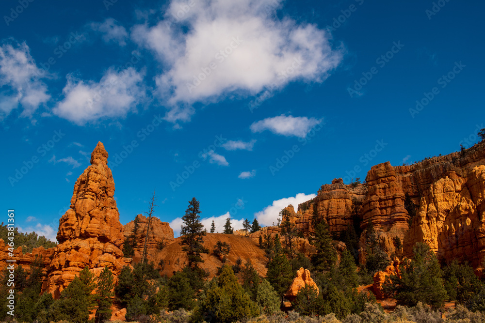 Hoodoos in red canyon on a sunny day