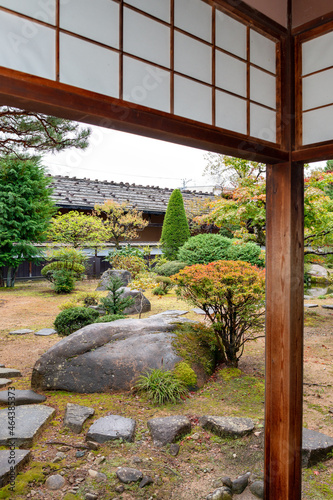 Traditional Japanese garden in Takayama Jinya in Gifu, Japan in autumn