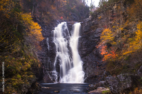 North River waterfalls, the highest waterfall of Nova Scotia Gushing water fall in an autumn forest landscape. North River Falls, Cape Breton, Nova Scotia, Canada