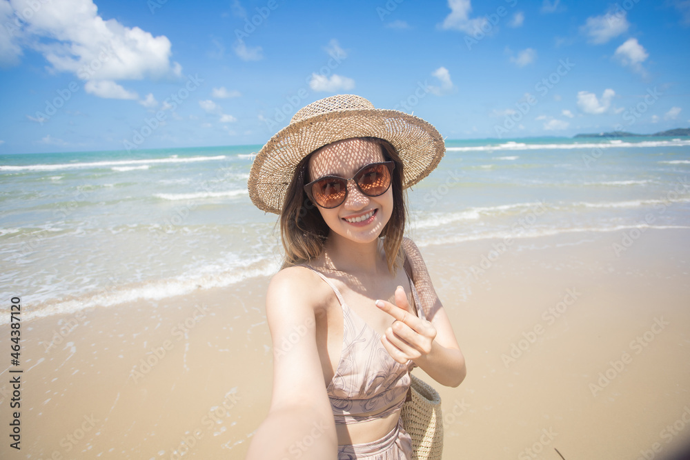 Woman Enjoying on the Beach. Beach vacation. happy young woman in the sea beach