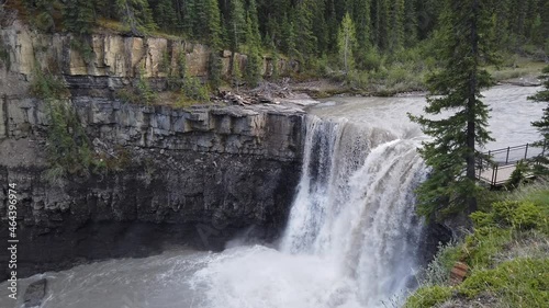 Water flows over Crescent Falls in the Alberta Rocky Mountains photo