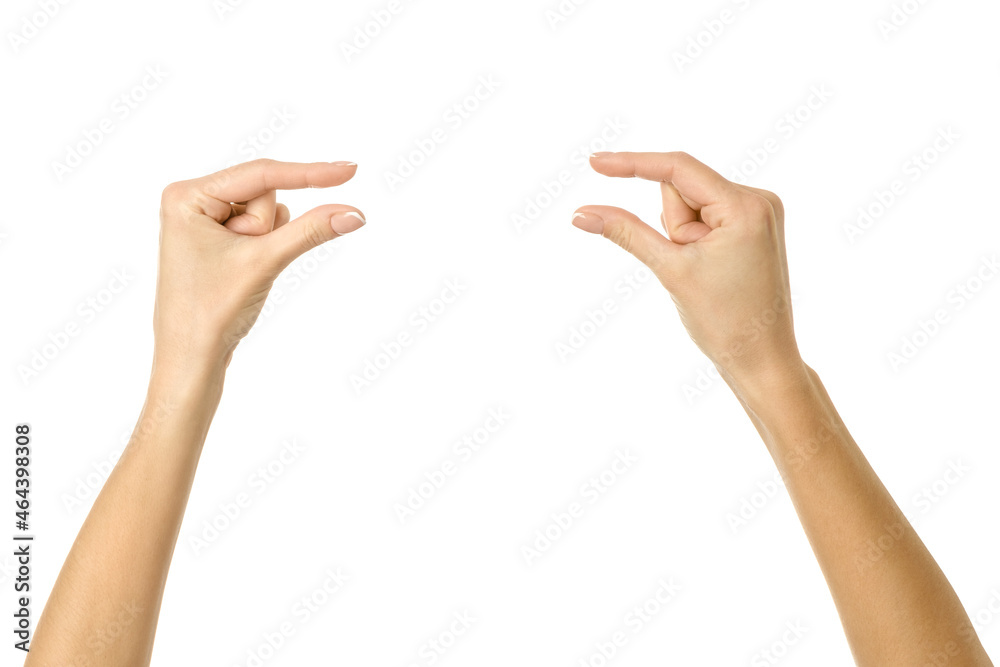 Holding or measuring hands. Woman hand gesturing isolated on white Holding or measuring hands. Woman hand gesturing isolated on white
