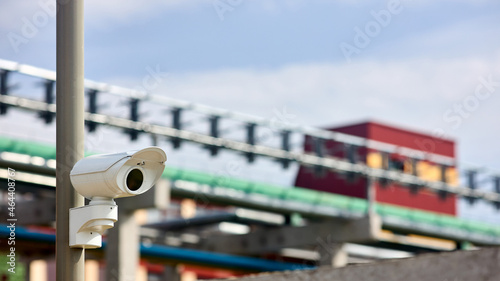 Explosion prevention modern petrochemical plant security system chemical factory surveillance system CCTV camera operating to prevent theft accidents explosions catastrophes and industrial espionage.