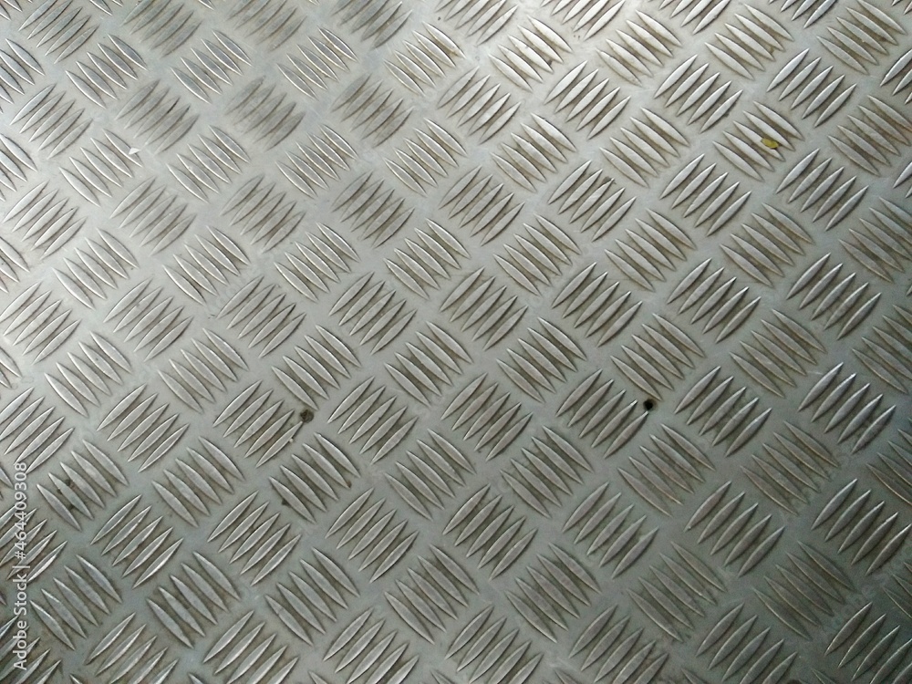 Anti-slip aluminum steel surface, old rust gray metal place texture background Anti-slip aluminum steel surface, old rust gray metal place texture background