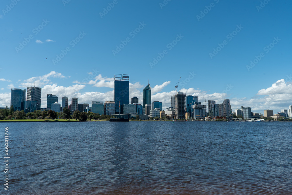 Fototapeta premium A view of the Perth city metropolitan skyscrapers from the other side of the swan river