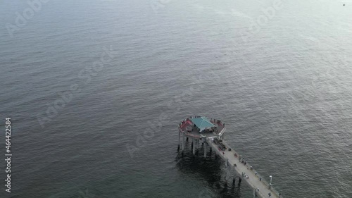 Bird's Eye View Of Expansive Concrete Fishing Pier In Okaloosa Island, Florida. Aerial Drone photo