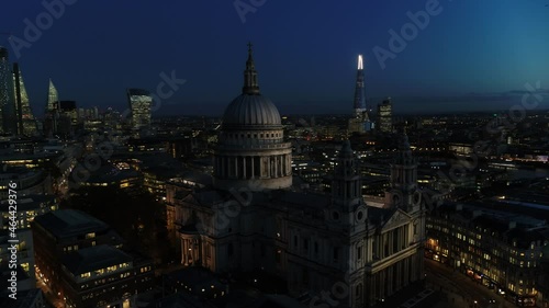 Aerial view at dusk of St Pauls Cathedral showing the Shard in the background photo