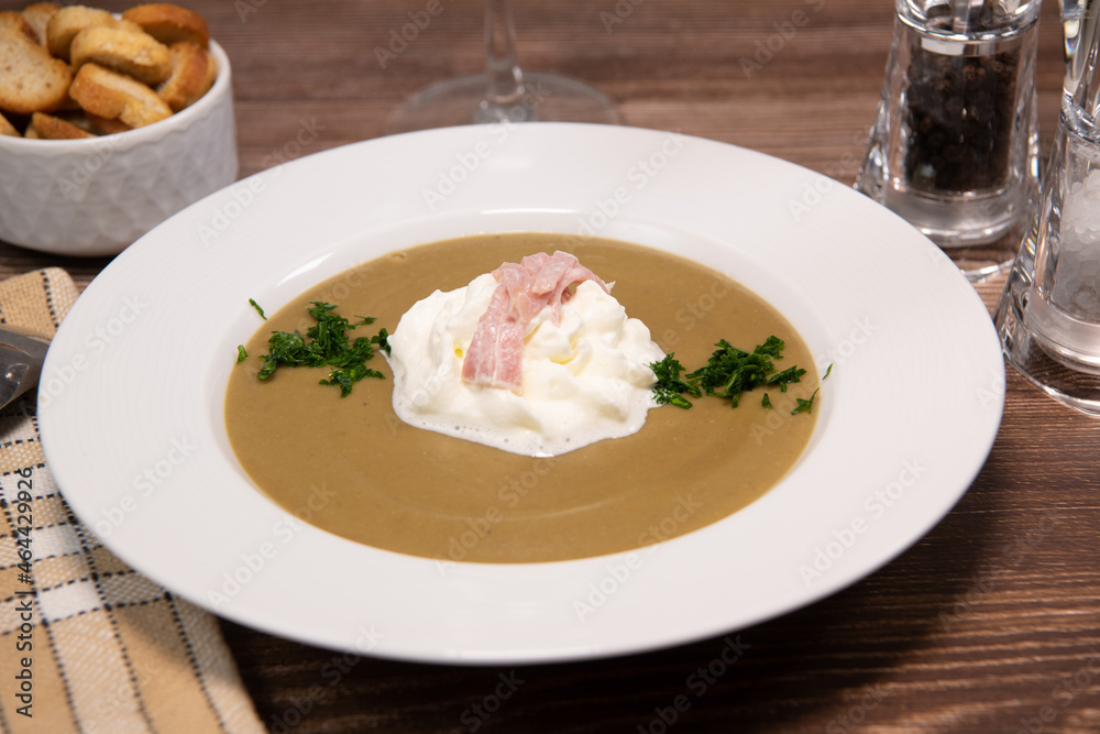 Lentil cream recipe with bacon whipped cream, vegetarian food. High quality photo Lentil cream recipe with bacon whipped cream, vegetarian food. High quality photo