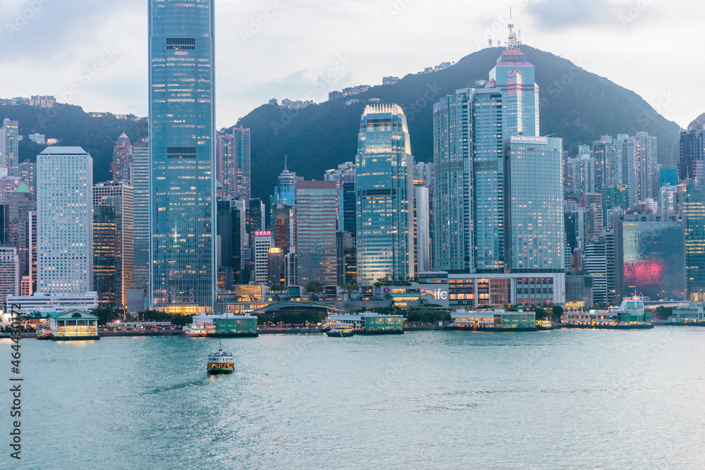 Fototapeta premium Colorful evening of the famous tourist location, Victoria Harbour, Hong Kong