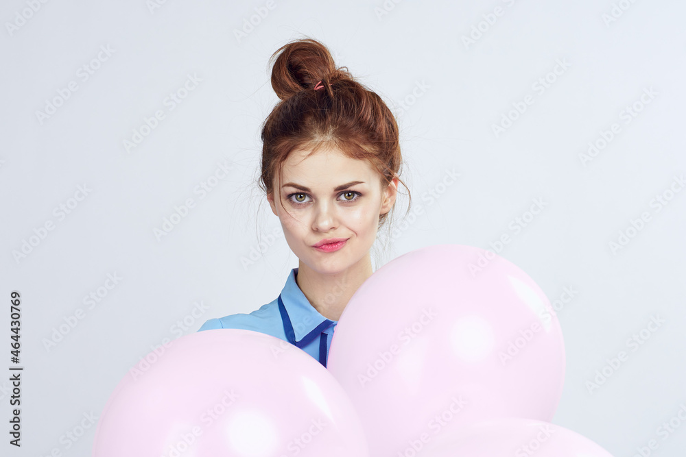 Fototapeta premium pretty woman with pigtails decoration holiday fun light background