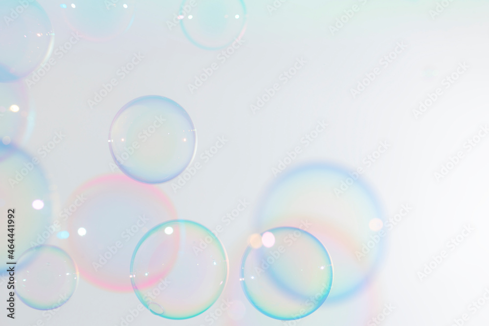 Beautiful Transparent Colorful Soap Bubbles on White Background
