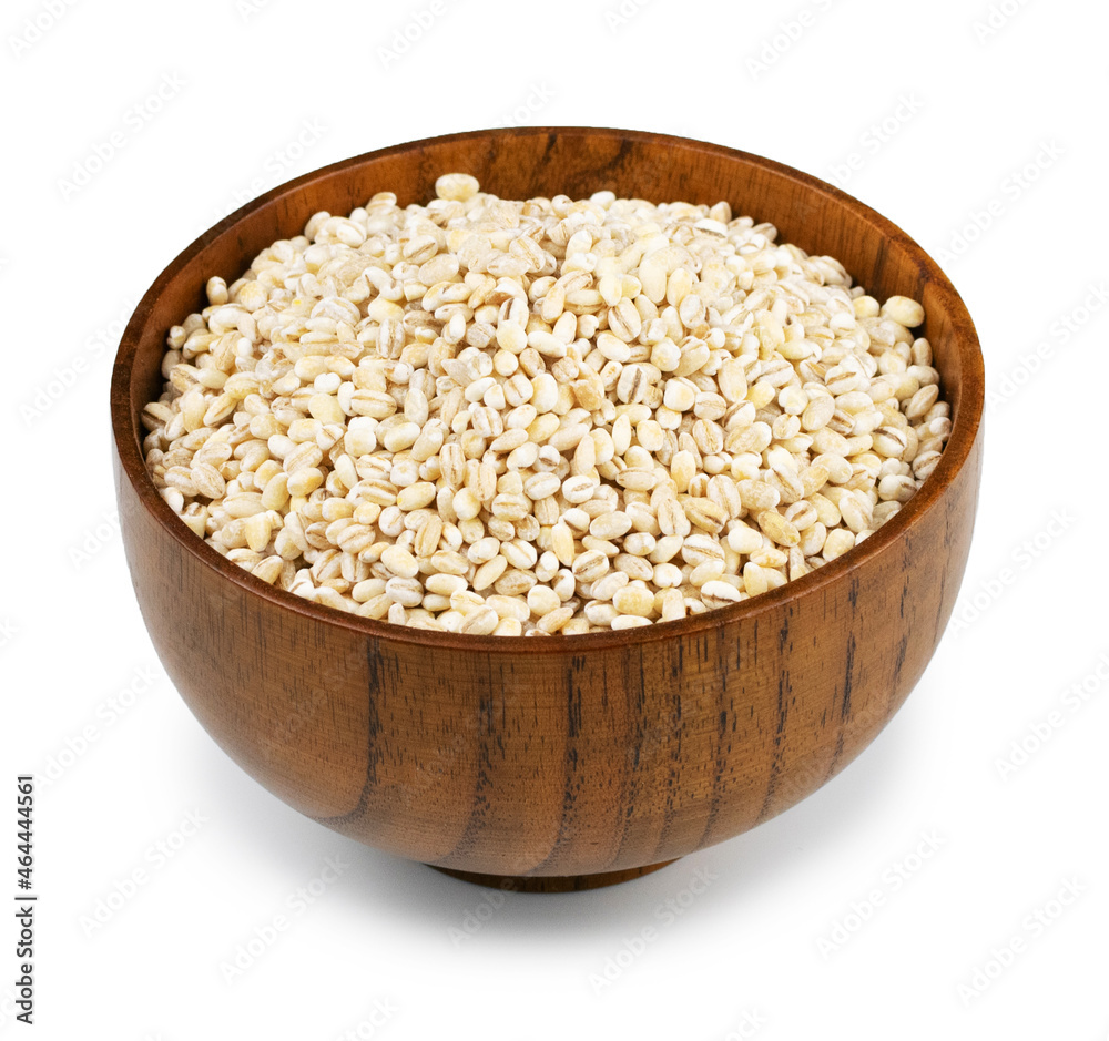 Pearl barley in a bowl on a white background. Isolate.