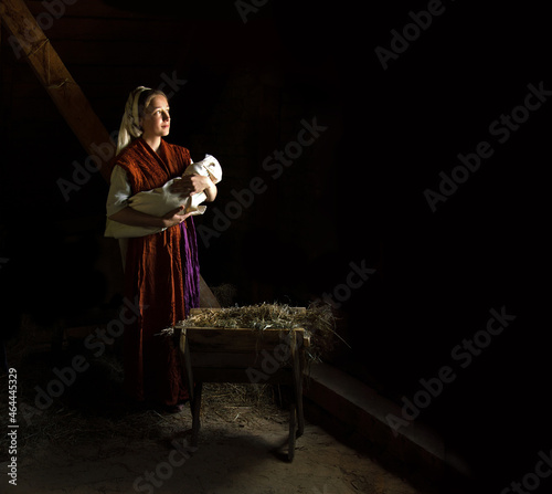 Obraz na plátně Mary in the stable near the manger with the baby