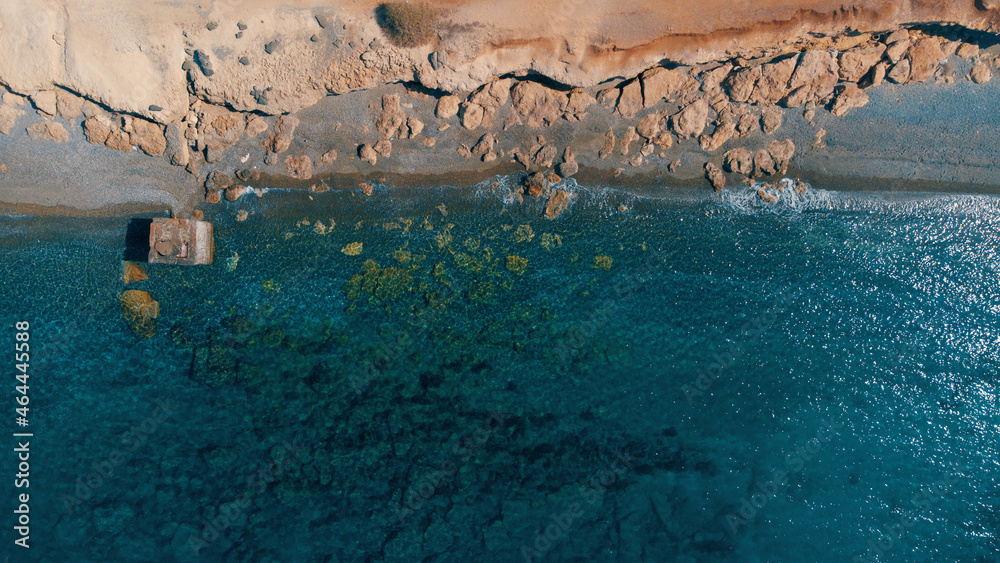 Backround of mediterranean seaside, rocks bay from drone perspective 