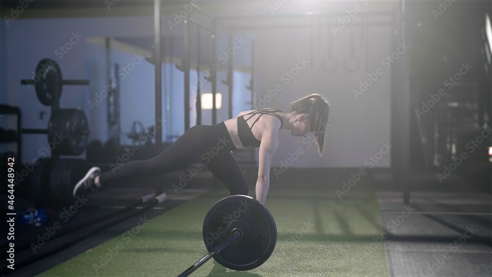 Fitness woman train landmine single leg romanian dead lift with barbell  Stock Photo | Adobe Stock