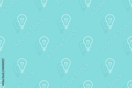 Background on the theme of light bulbs and lighting.Seamless pattern From the silhouette of light bulbs.