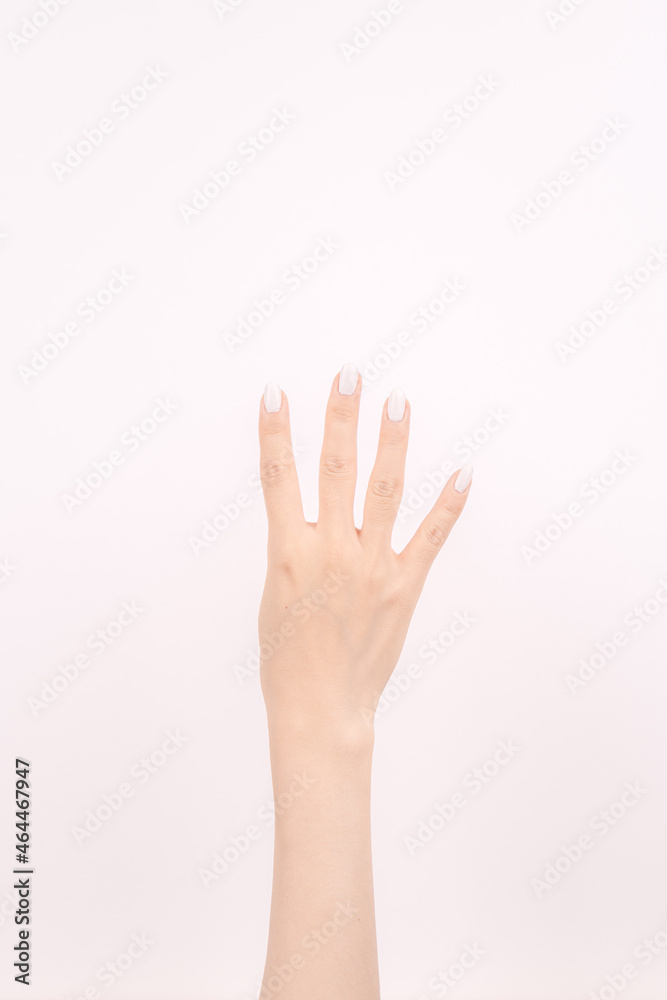 hand showing number four In front of the white background hand showing number four In front of the white background