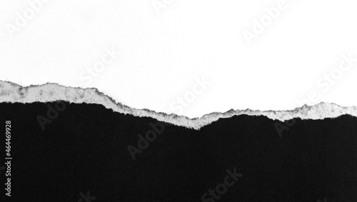 Black paper with torn marks placed on a white background. image for background with copy space
