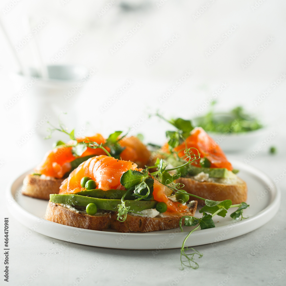 Homemade salmon bruschetta with green pea