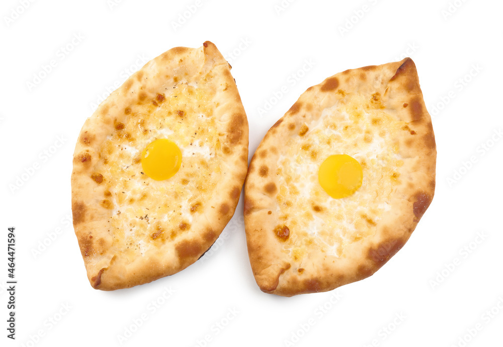 Fresh delicious Adjarian khachapuris on white background, top view Fresh delicious Adjarian khachapuris on white background, top view