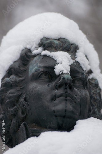 The snow-covered Mozzar Monument in Salzburg photo