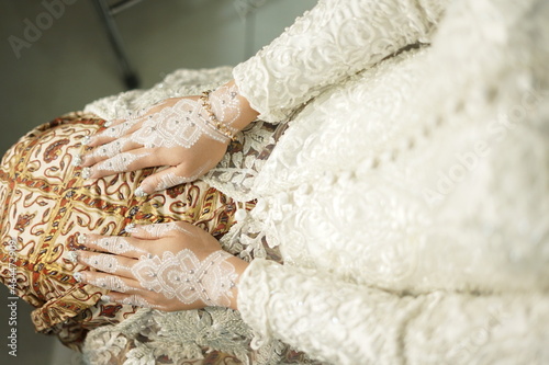 Bride henna carved beautiful and unique at bride's hand