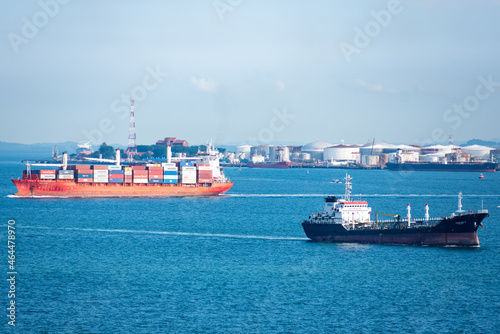 Cargo ships sailing near port of Singapore.