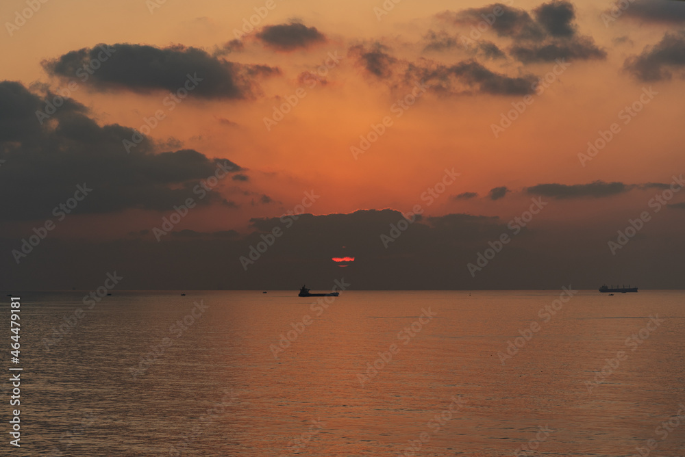 Sunrise over the sea, near Port Said, Egypt. View from the cargo ship transiting Suez Canal. 