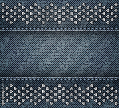 Blue denim background with stitches and silver sequin zig-zag stripes.