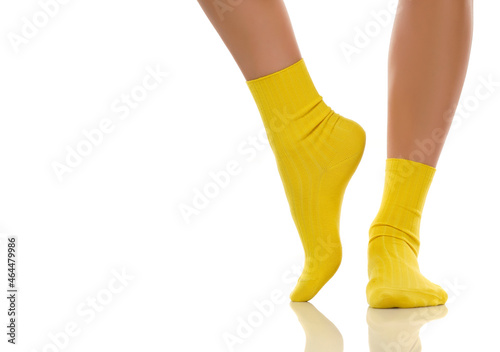 Pretty female feet in yellow short socks
