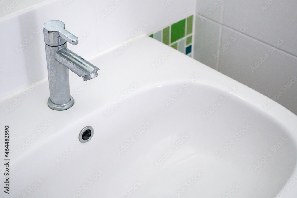 white sink and faucet bathroom interior white sink and faucet bathroom interior