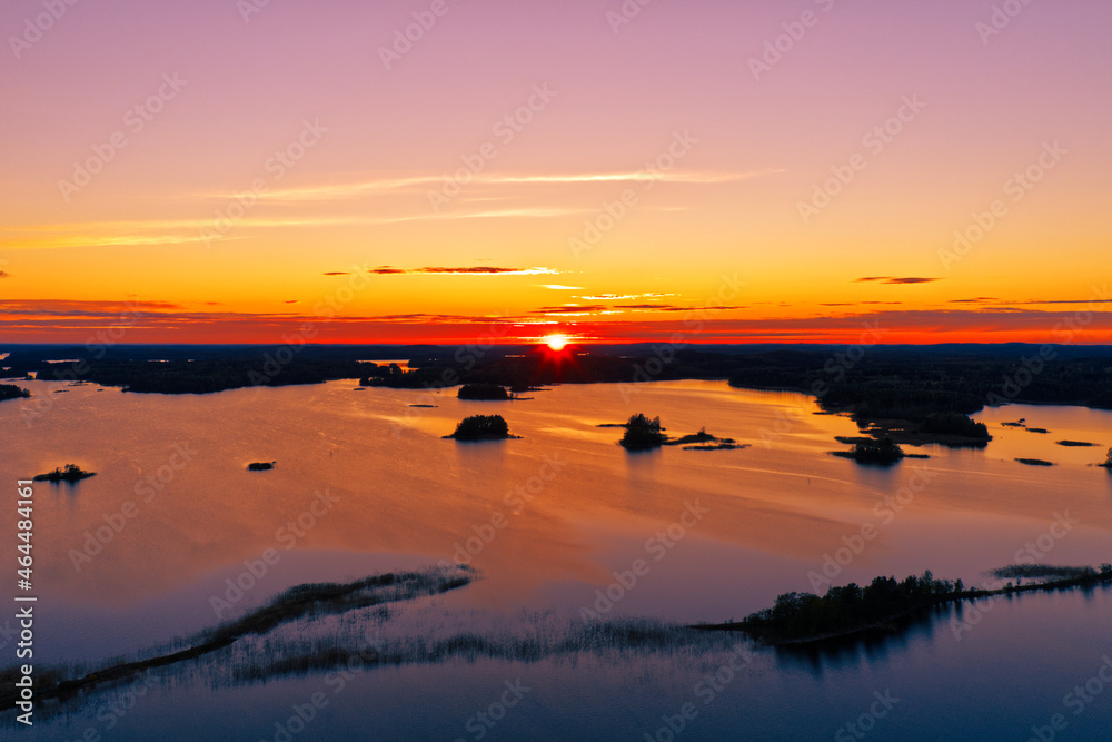 Aerial drone photo of lake scenery with small islands by gorgeous sunset. Aerial drone photo of lake scenery with small islands by gorgeous sunset.