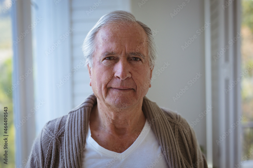 Portrait of senior caucasian man looking at camera at home Portrait of senior caucasian man looking at camera at home