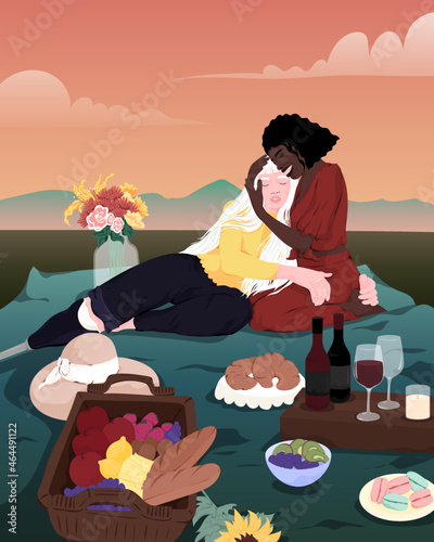 Two women embrace at picnic