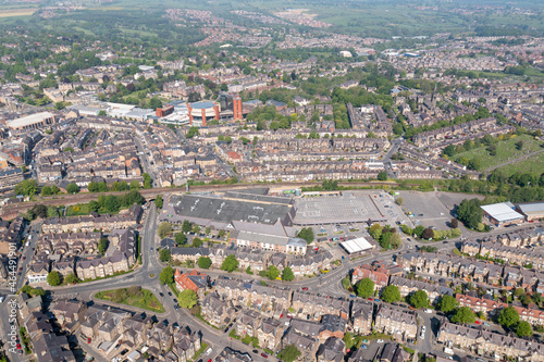 Aerial drone photo of the beautiful historical town of Harrogate, North Yorkshire in the UK showing the residential housing estates and rows of houses from above in the summer time