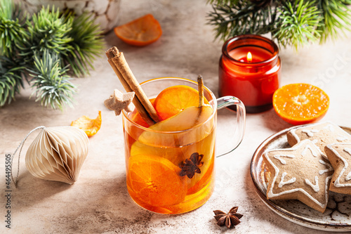 White mulled wine with tangerines, pears and cinnamon.