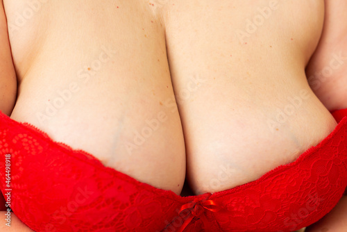 Beautiful big woman's breasts,boobs, in red bra