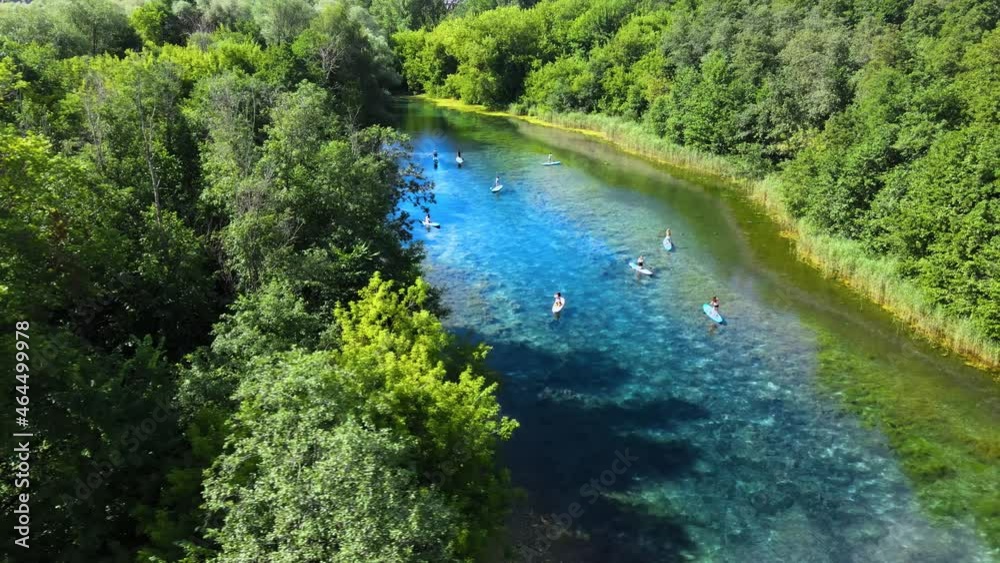People in harmony with nature. Relaxing holiday on a lake. Clear water reflects People in harmony with nature. Relaxing holiday on a lake. Clear water reflects