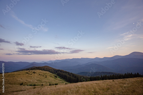 concept of evening sky in the mountains. the beauty of hiking in the mountains. landscape on top of the mountain