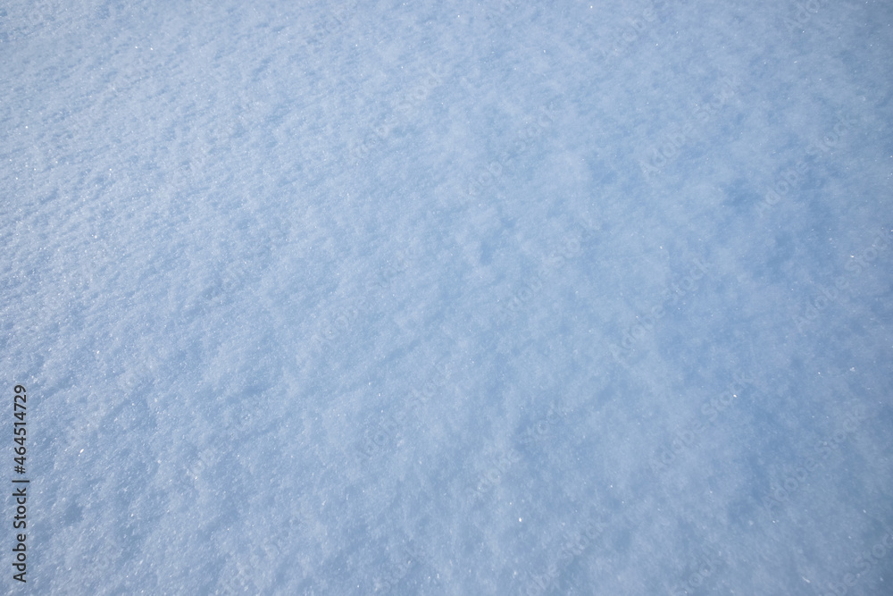 Blue snowflake texture on winter season natural background