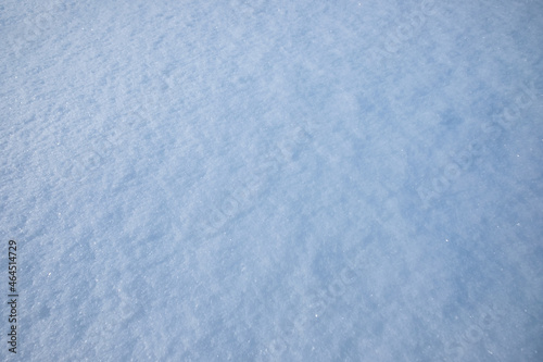 Blue snowflake texture on winter season natural background