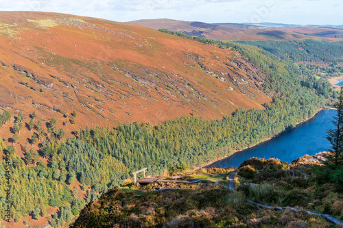 Mountain lake landscape, view from the popular Spinc trail over the Glendalough Upper Lake in Wicklow Mountains, Ireland.