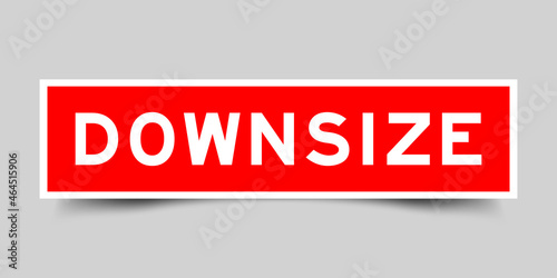 Sticker label with word downsize in red color on gray background