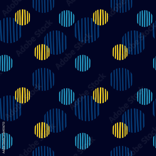 Vector simple pattern with big colorful circles. Stylish seamless background with navy blue background and blue and yellow polka dots. Pattern for fabric, textile, wallpapers, wrapping paper, etc.