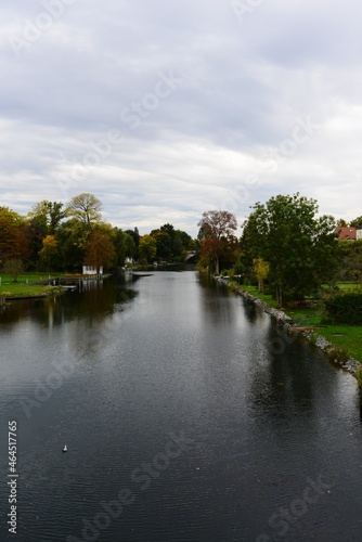 water canal on an autumn day against the sky