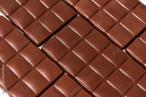Close up shot of many sweet delicious chocolate bars pattern isolated