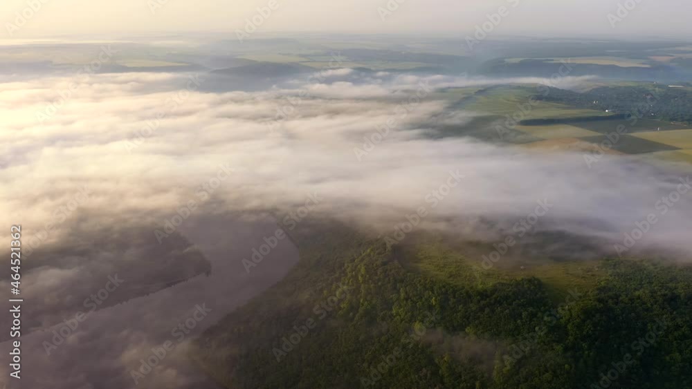 Shooting from a drone of a foggy morning landscape of a Dniester River. Filmed in 4k, drone video. Shooting from a drone of a foggy morning landscape of a Dniester River. Filmed in 4k, drone video.