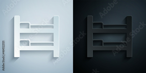 Paper cut Bunk bed icon isolated on grey and black background. Paper art style. Vector